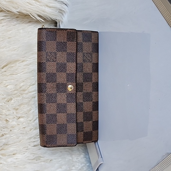Louis Vuitton Handbags - Authentic Louis Vuitton Damier Ebene Sara Wallet.